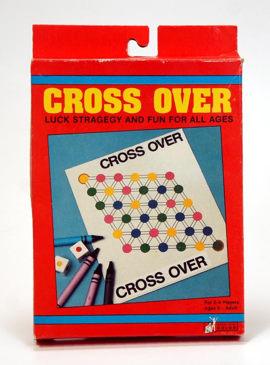 Vintage Cross Over board game packaging with colorful dots and dice illustration.