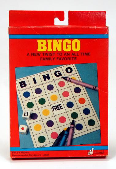 Vintage Bingo game box with colorful chips and cards.
