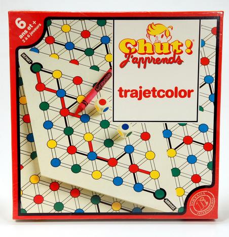 Vintage Trajetcolor board game with colorful paths and markers.