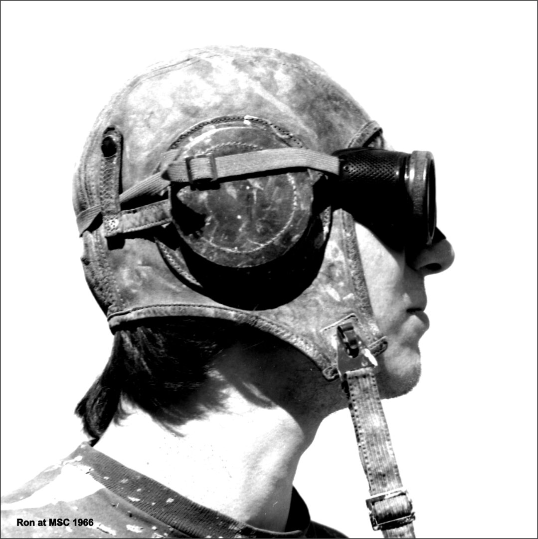 Profile of a soldier wearing a helmet and goggles.