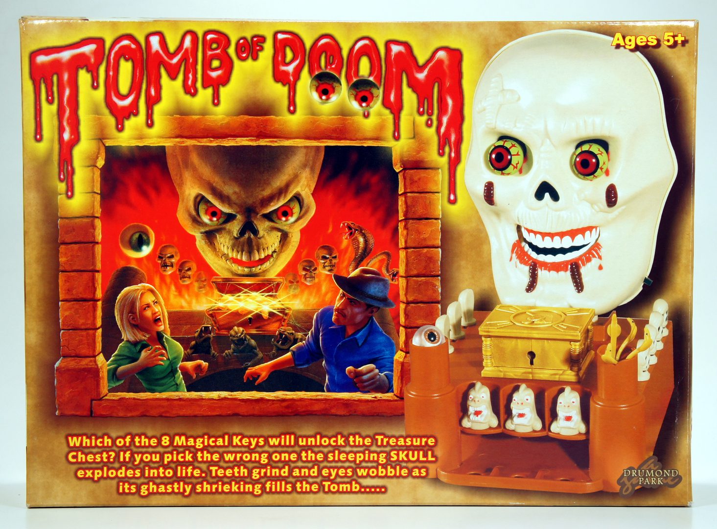 Vintage Tomb of Doom board game box with spooky skeleton figure.