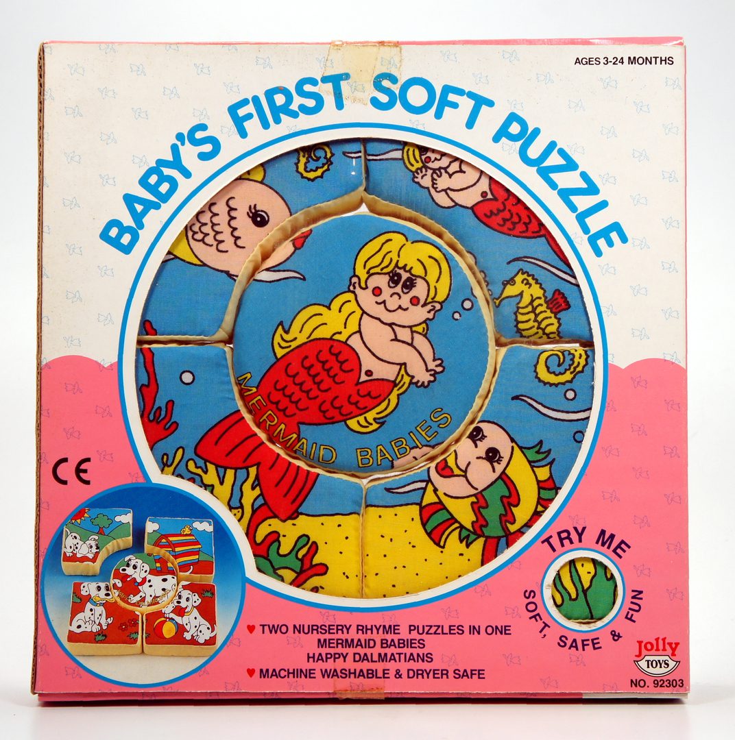 Box of Baby's First Soft Puzzle with colorful animal and baby illustrations.