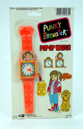 Vintage Punky Brewster pop-up watch with bright orange strap.