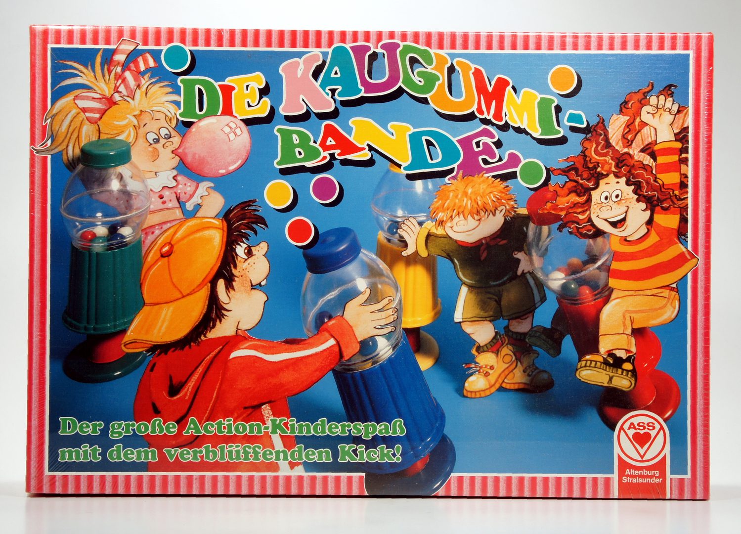 Colorful children's board game box with playful characters and balloons.