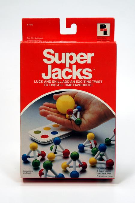 Box of the classic board game Super Jacks with colorful jacks and ball.