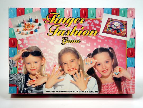 Three girls modeling colorful finger rings in a finger fashion game.