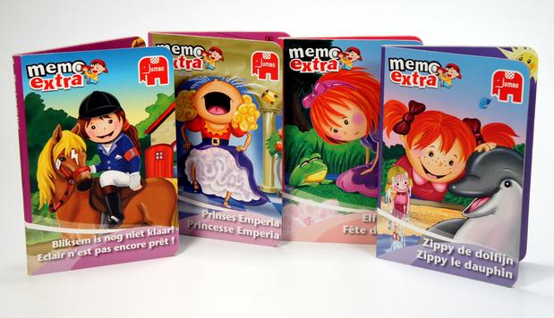 Four colorful Meme Extra card game boxes with playful cartoon characters.