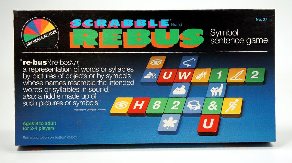 Vintage Scrabble Rebus game box with colorful letter tiles.