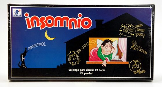 Vintage insomnia-themed game box with cartoon character in bed.