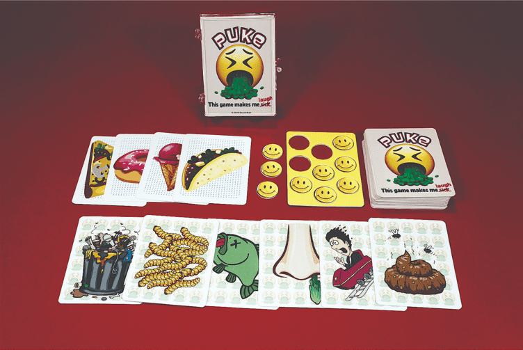 A collection of Ducko trading cards with various character illustrations.