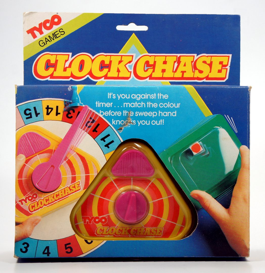 Vintage Tyco Clock Chase game with colorful spinner and timer.