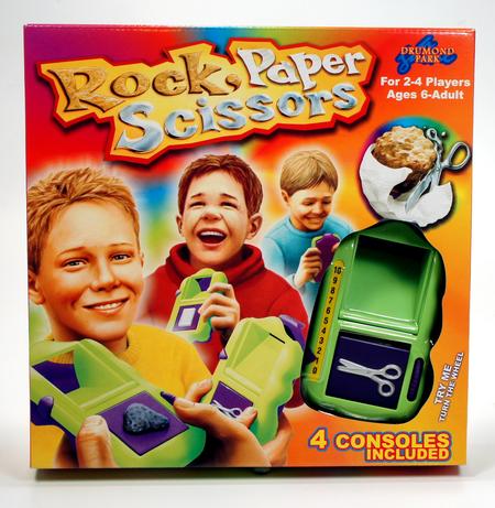 Rock Paper Scissors handheld game with kids on the box.