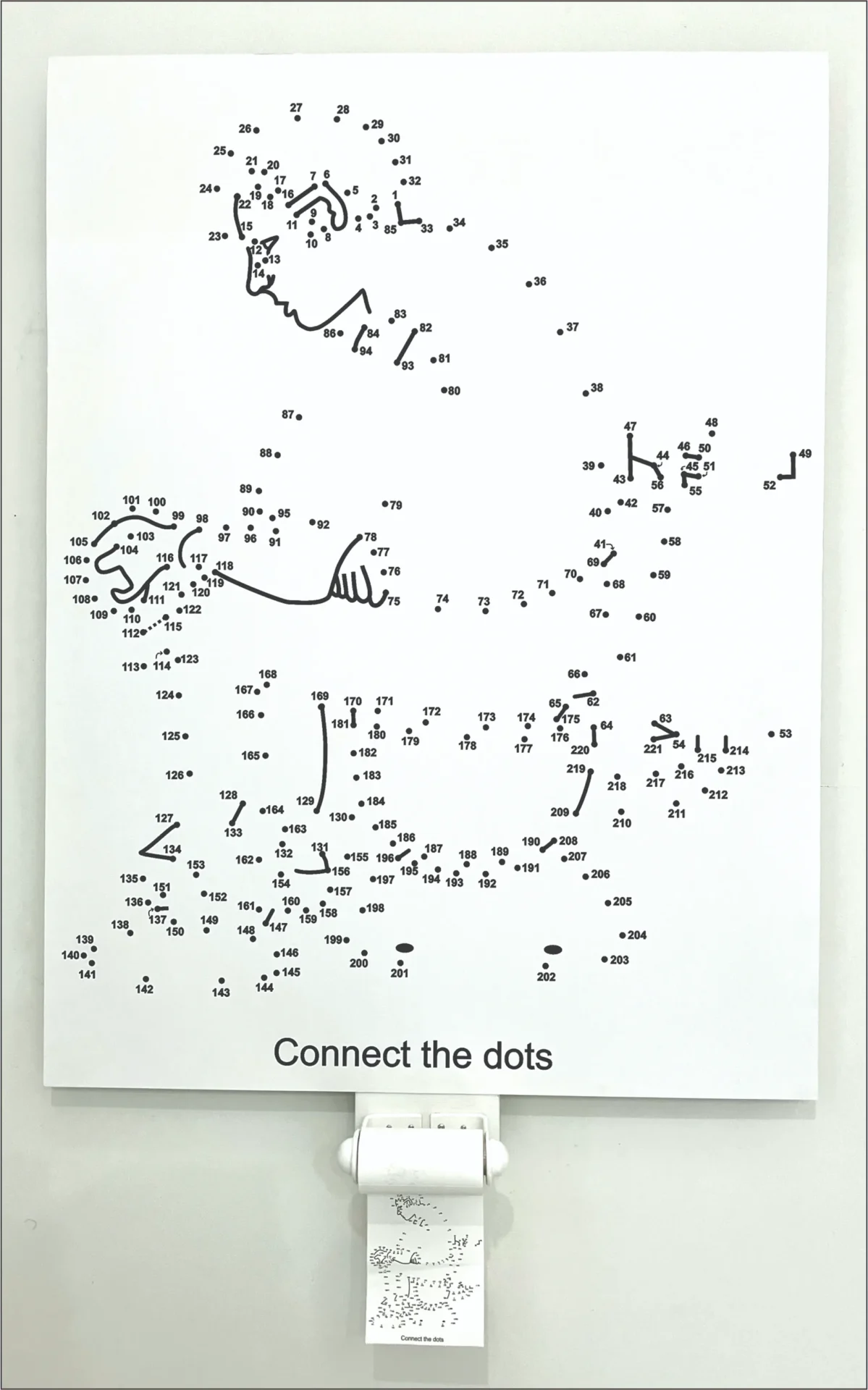 A connect-the-dots puzzle with scattered dots and numbers.
