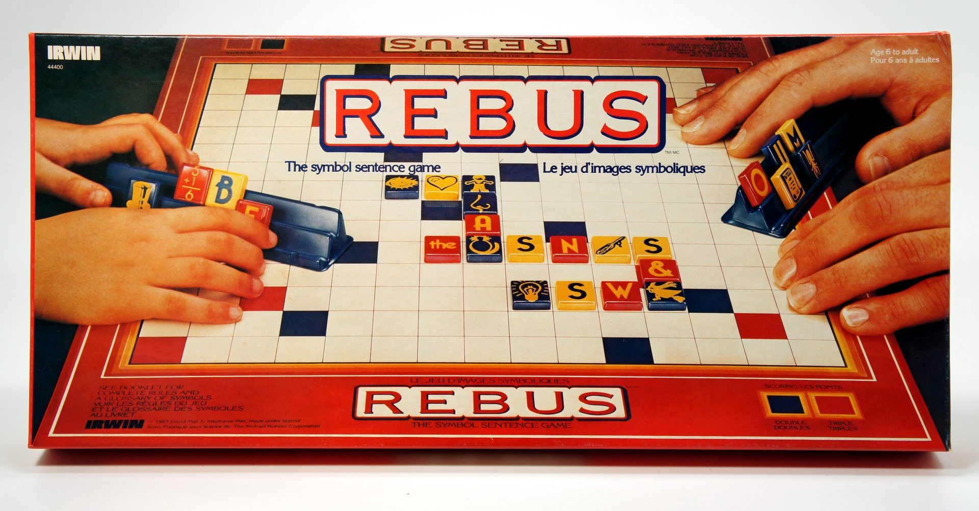Rebus board game with letter tiles arranged on a grid.