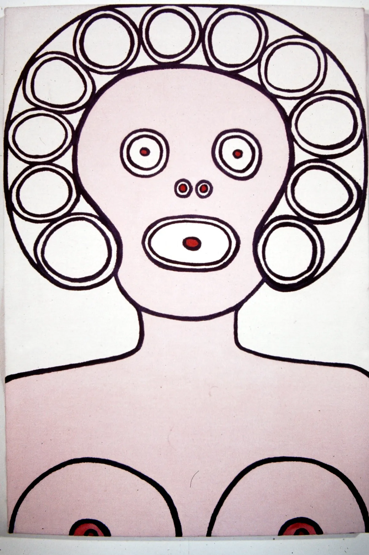 Abstract face drawing with circular hair and simple facial features.