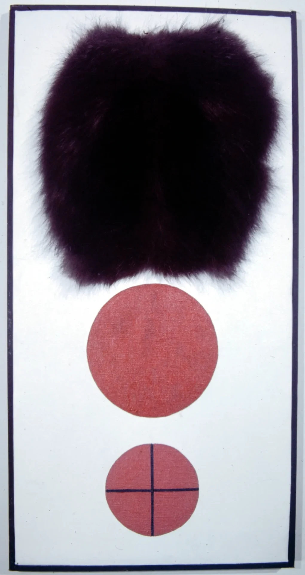 Abstract art with a large black shape above a textured red circle on white background.