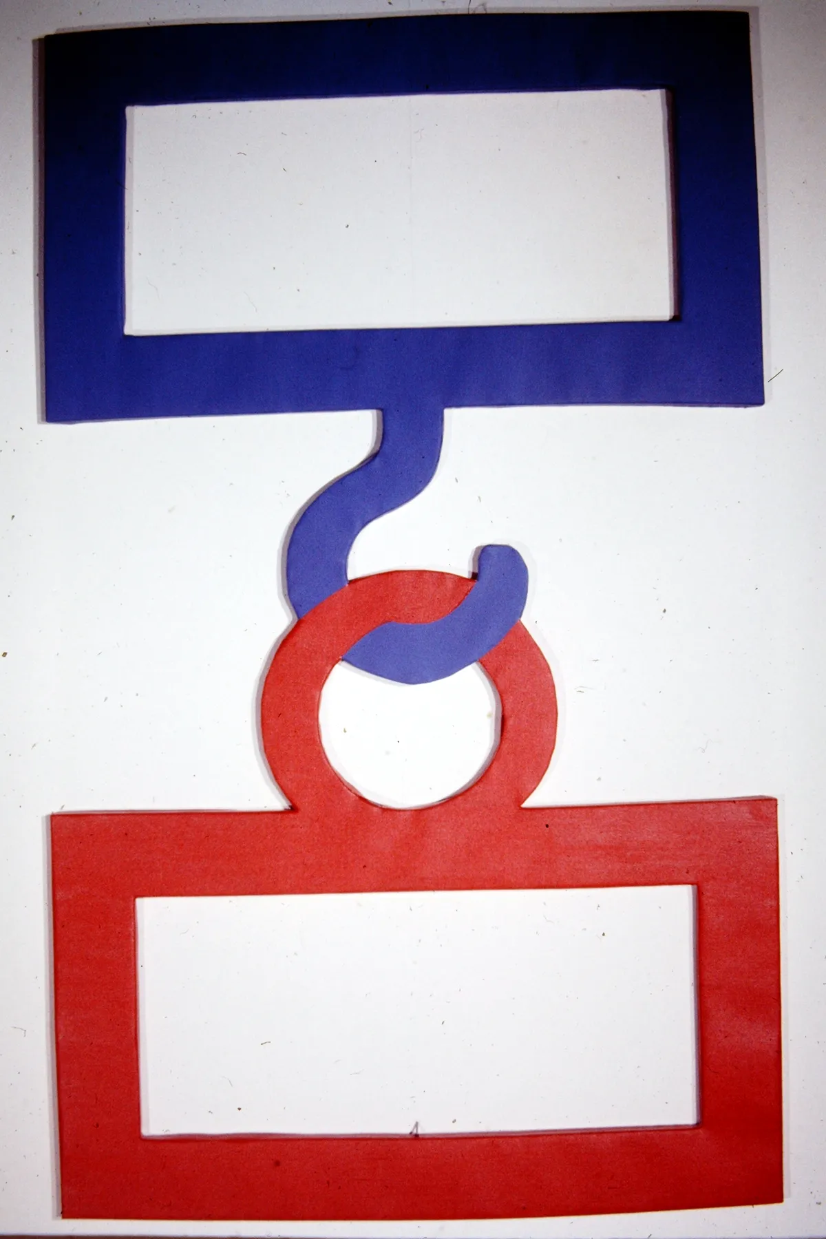 Abstract geometric shapes in red and blue on a white background.