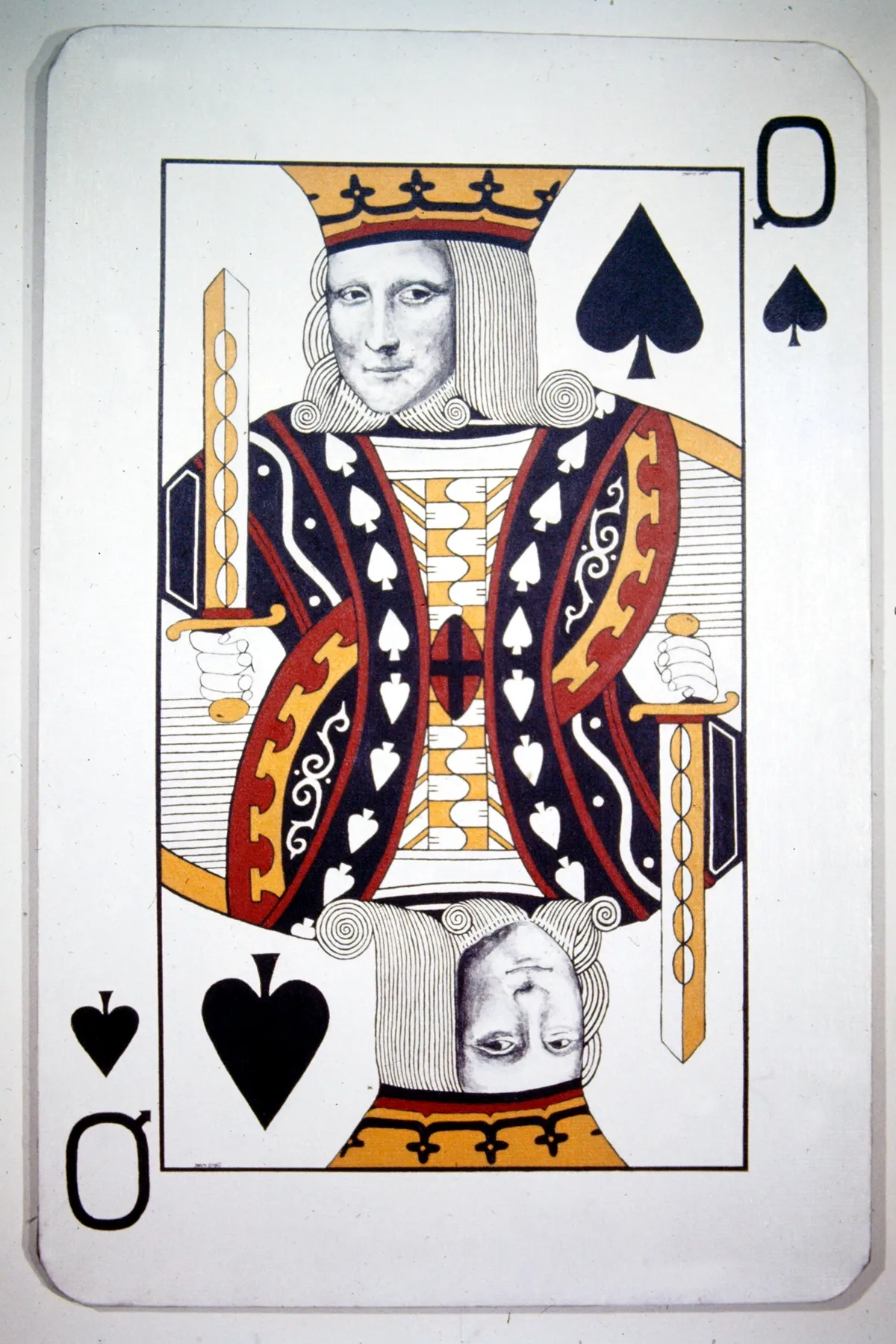 A custom King of Spades playing card with intricate designs.