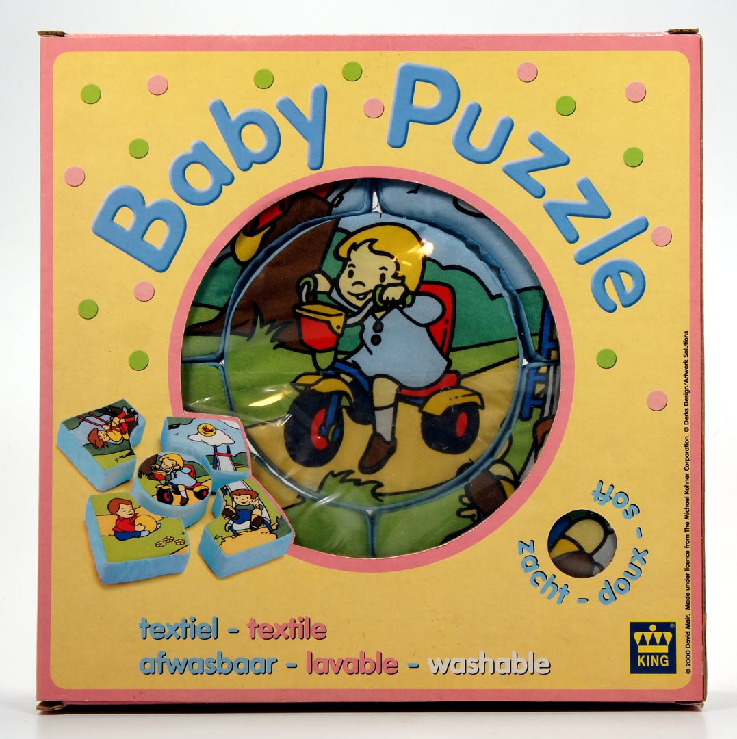 Vintage Baby Puzzle game box with colorful illustrations.