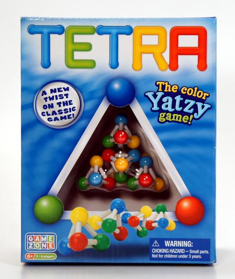 The Color Yatzy Game called Tetra with colorful balls and triangle board.