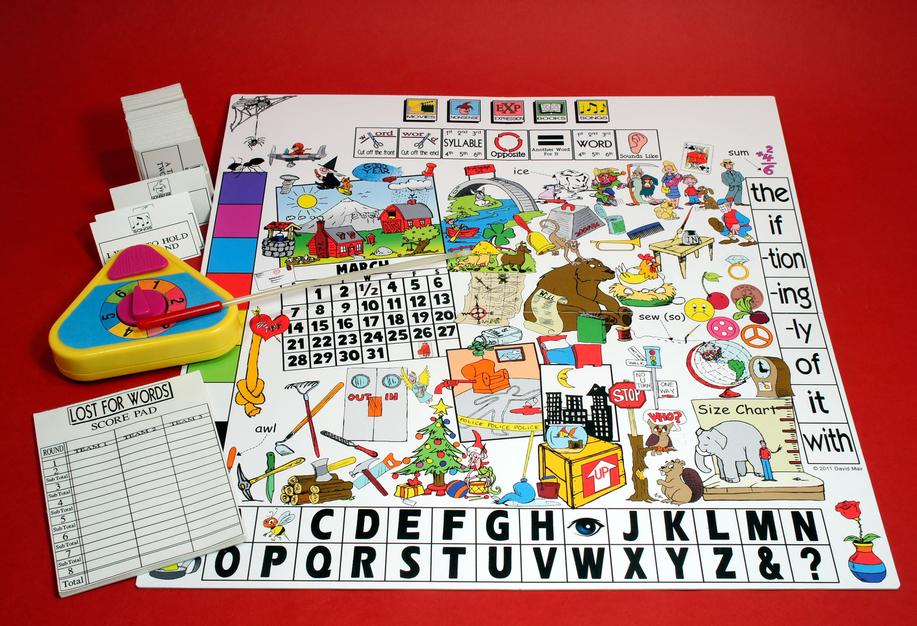 A colorful educational board game with alphabet and picture cards.