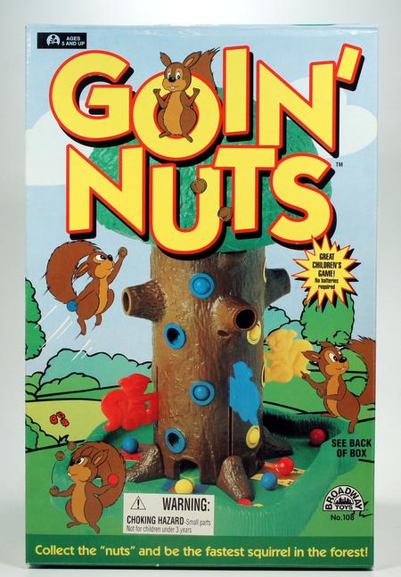 The Goin' Nuts board game with a squirrel and a tree trunk.
