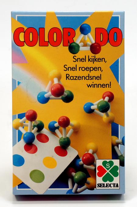 Colorful board game with playful marbles and vibrant dots.