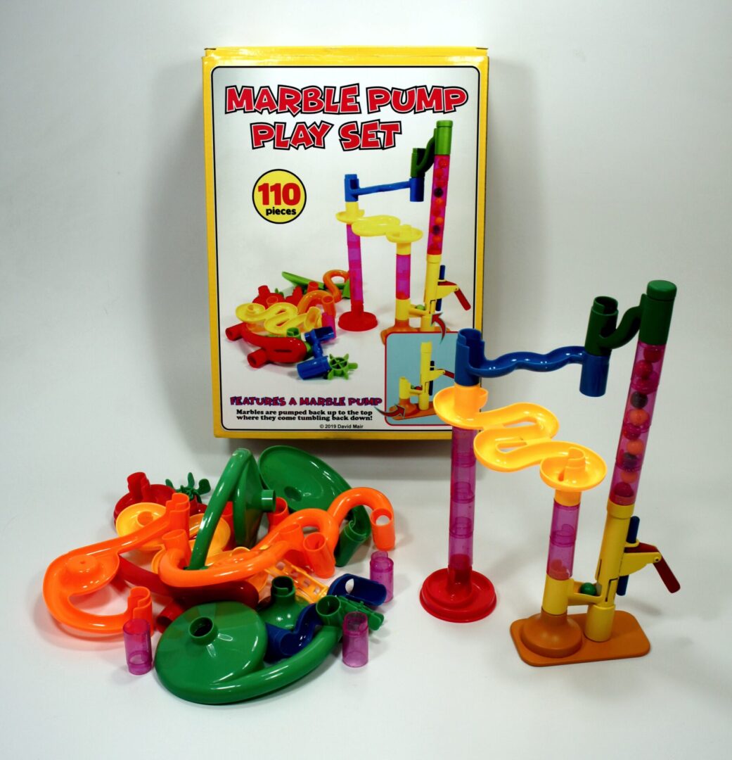 Colorful marble run play set with various ramps and slides.