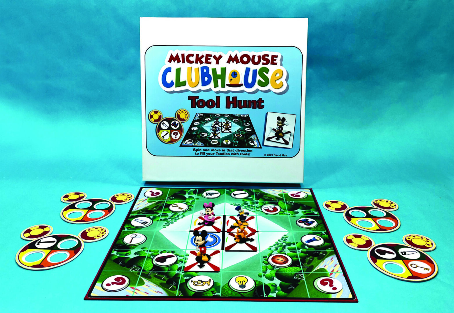 A colorful Mickey Mouse Clubhouse board game with characters and game pieces.
