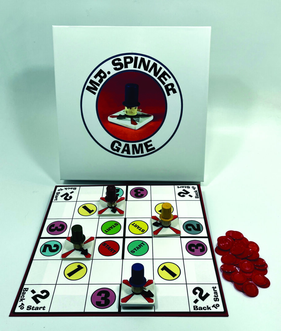 A board game named "143 Spinner Games" with colorful tokens and cards.