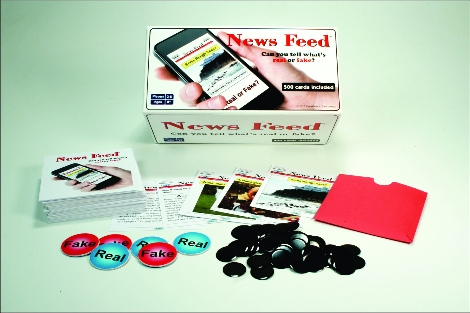 A news feed-themed card game with cards, chips, and tokens.