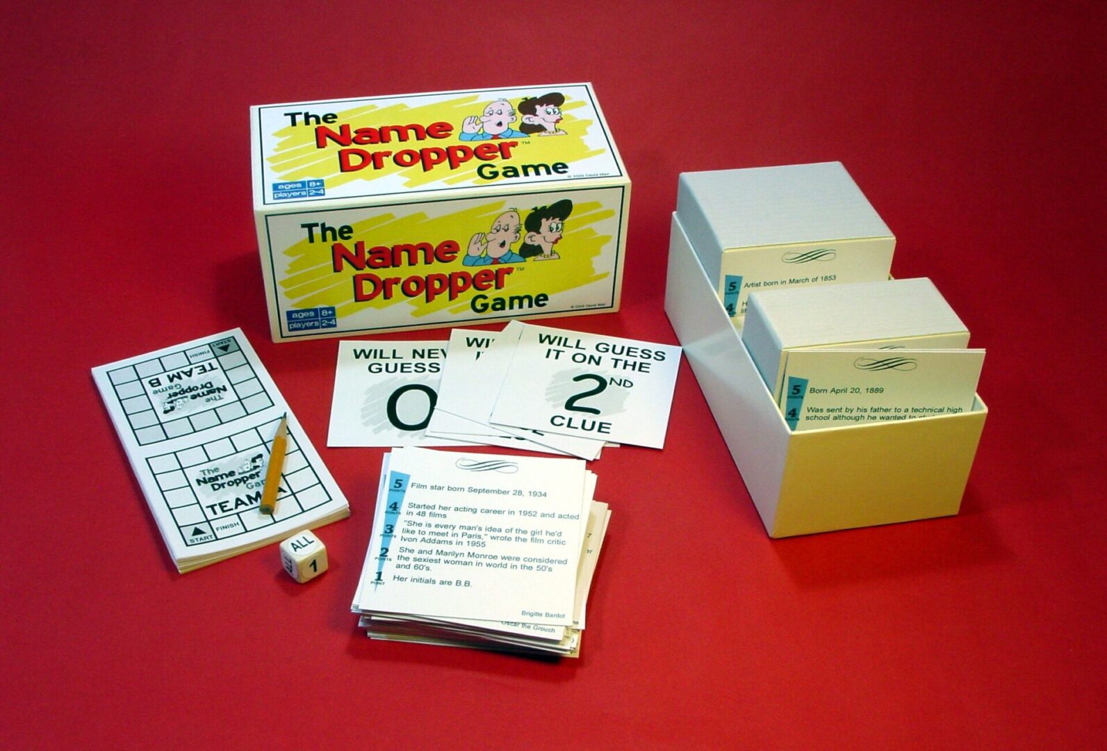 Vintage 'Name Droppers' board game with cards and dice.