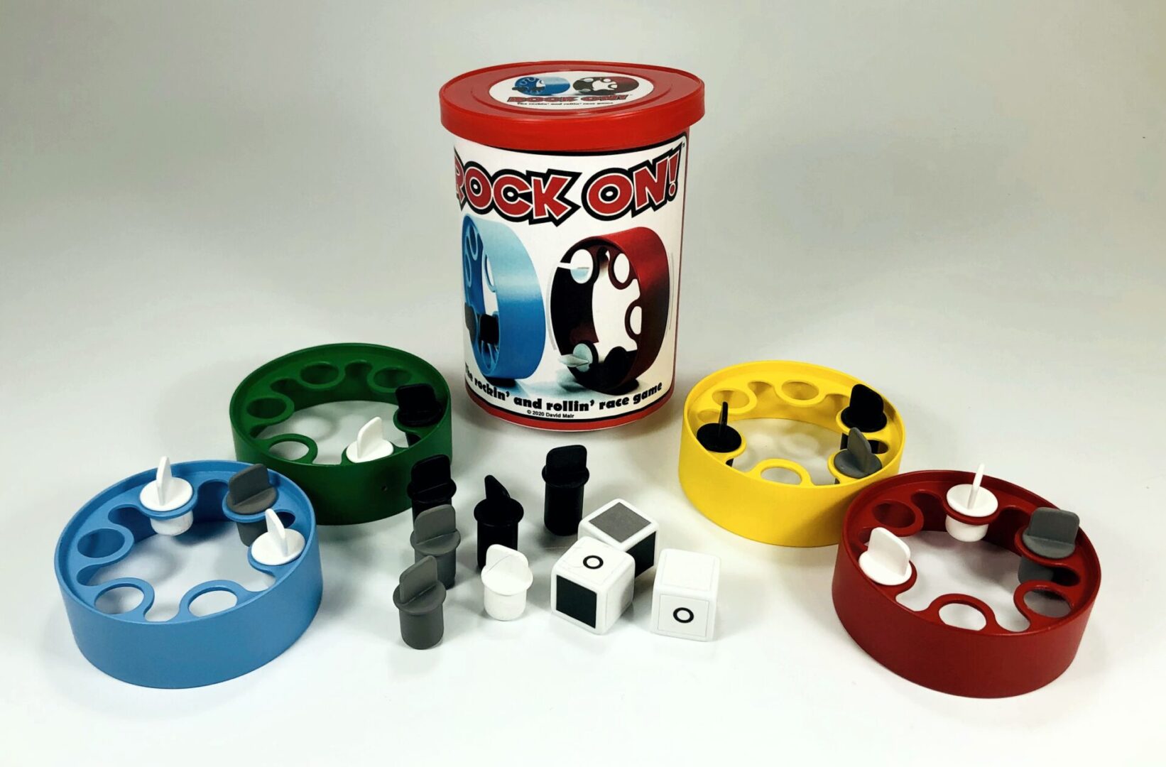 A board game with colorful playing pieces and dice.