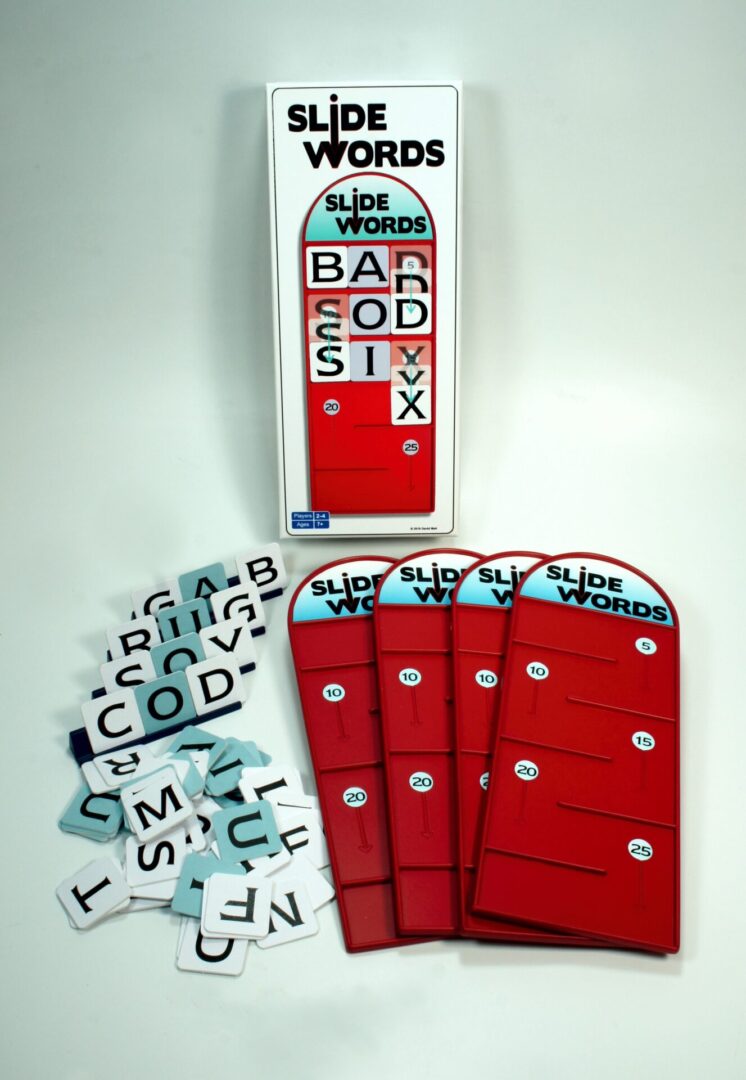 A word-building board game with letter tiles and red player holders.