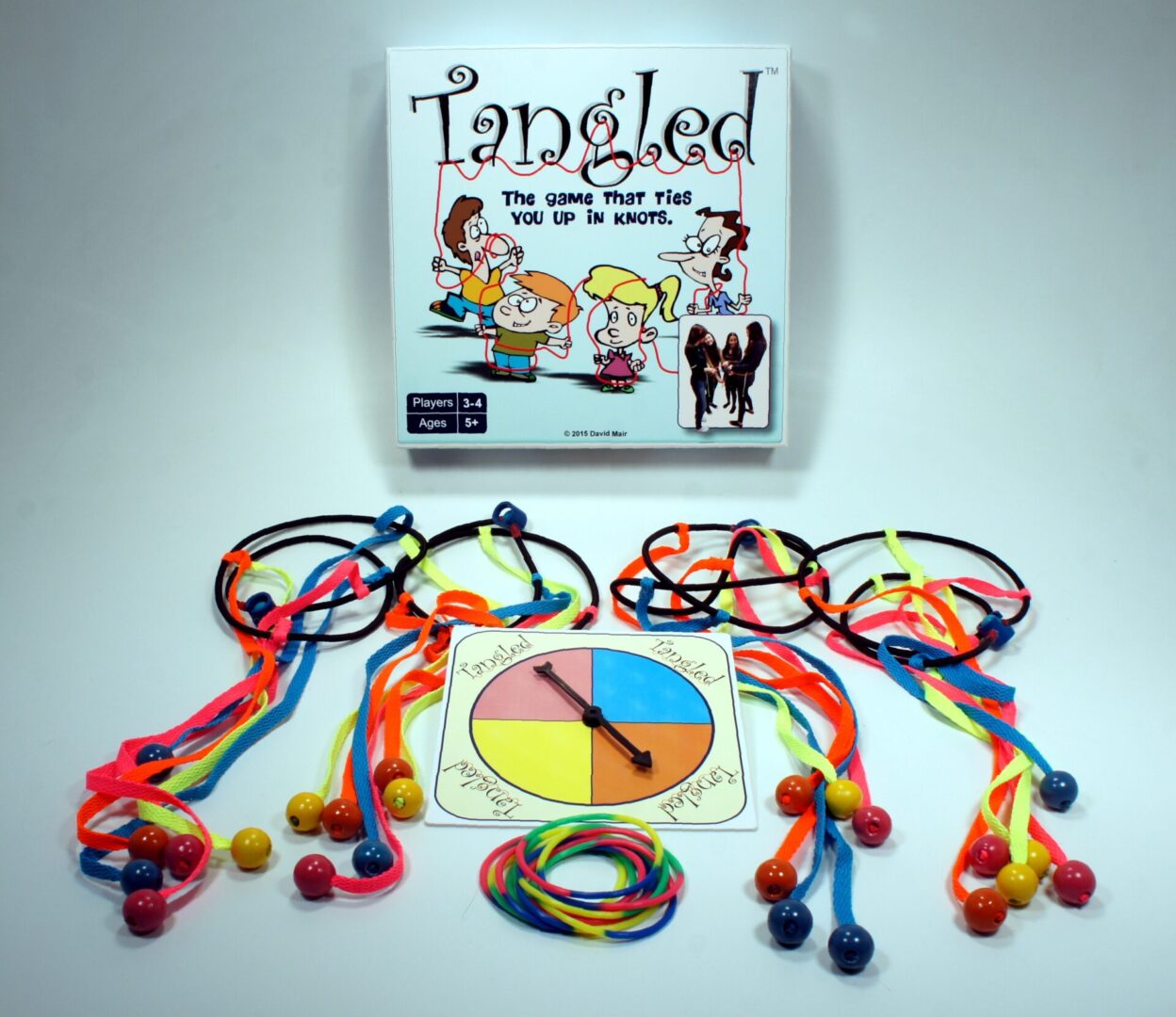 The Tangled game with colorful string puzzles and a spinner.