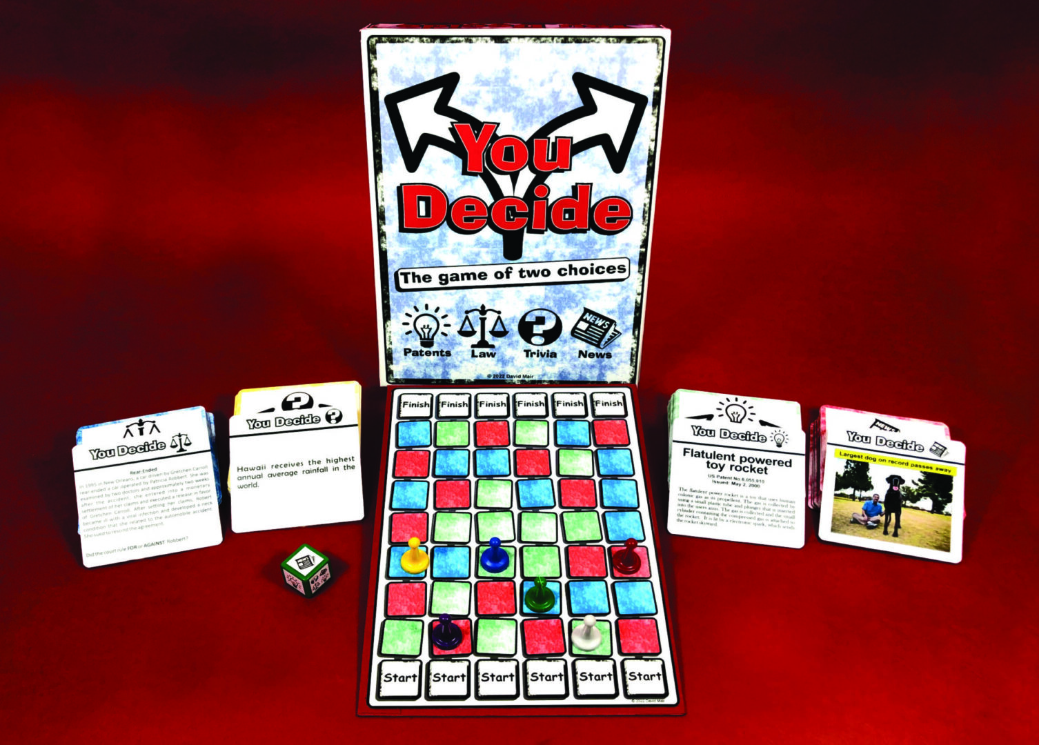 Board game "You Decide" with colorful squares and cards.